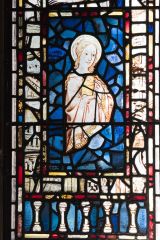 Stained glass tower window depicting Mary Magdalene