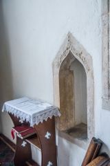 Burnham Sutton-cum-Ulph, All Saints Church, The simply carved medieval piscina