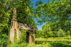 A pump house in the woodland garden