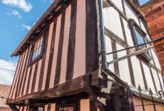 The projecting timber-framed first floor