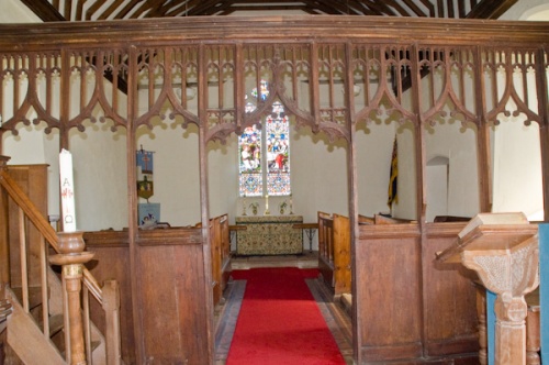 The ornately carved rood screen