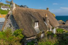 A thatched cottage above the harbour