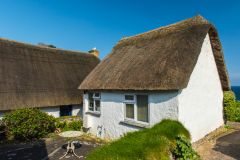 A pretty little thatched cottage near the harbour