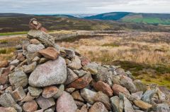 At the top of the cairn