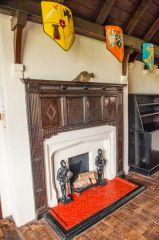 A fireplace in the great hall