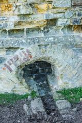 A drainage channel under the north-east wall