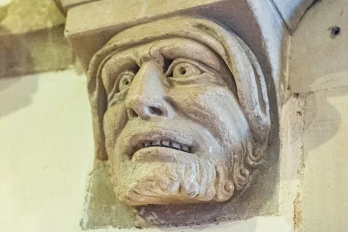 Medieval carved head corbel