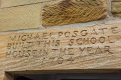 Inscription over the schoolhouse door