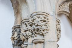 An ornately carved column capital