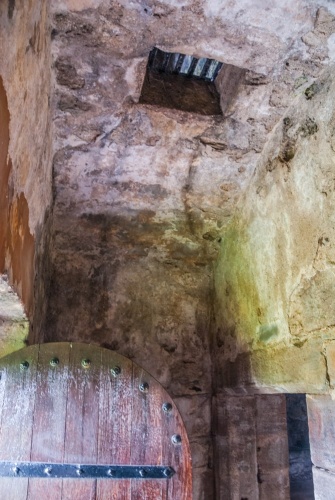 A murder hole is set above the entrance