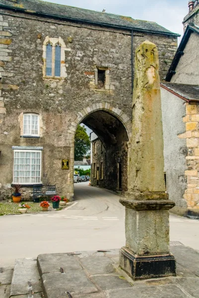 The gatehouse and market cross