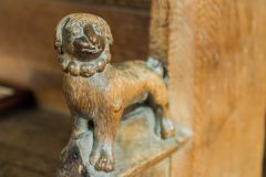 Figure of a dog, chancel bench end