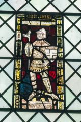 Medieval stained glass figure of a knight