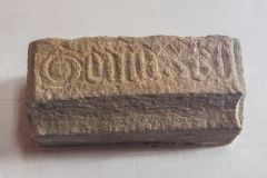 The inscribed stone corbel