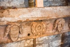 Medieval carved frieze in the porch