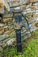 The cast-iron village water pump