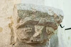 Carved corbel head