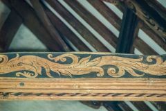 A closer look at a painted roof timber