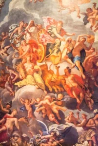 Richly painted scenes decorate walls and ceilings