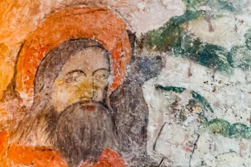 Medieval wall painting on a nave pillar