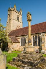 The churchyard cross and west tower