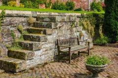 A garden bench near the castle