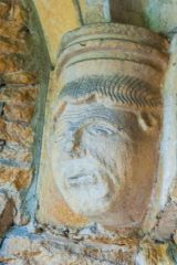 Carved head, south porch