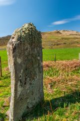 The reverse (uncarved) face of the standing stone