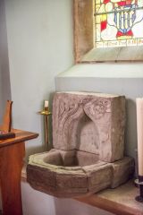 Medieval piscina in the sanctuary