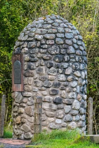 The memorial cairn from across the A82
