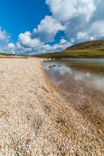 The pebble beach at Coire Fhionn Lochan