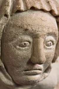 Medieval carved head, chancel