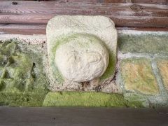 Medieval carved head, south porch