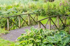 A footbridge leading to the Reflection Ponds