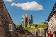 Corfe Castle Village, The castle rises above the village rooftops
