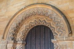 Norman decorative carving on the doorway arch