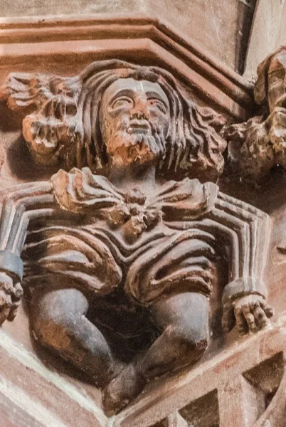 Grotesque medieval carving on the nave arcade