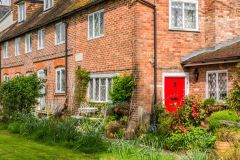 Historic houses line the churchyard
