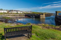 A bench overlooking Craster harbour