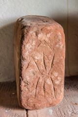 Ancient carved stone in the porch