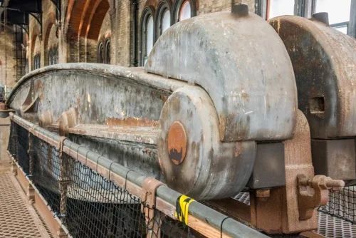 One of the unrestored beams