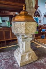 The ornately carved 1395 font