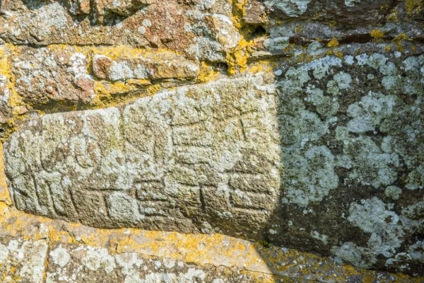 6th-century carved stone set into the tower