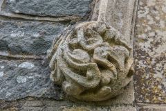 A ball flower carving on the south porch arch