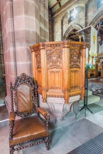The beautifully-carved 19th-century pulpit