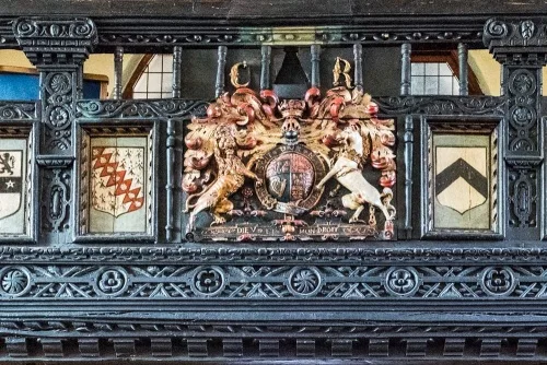 The west gallery and royal coat of arms