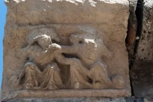 Carving on the corner of the Hall building