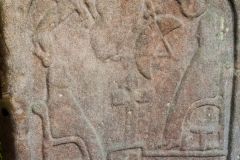 A pair of seated figures