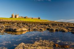 Dunstanburgh Castle from the shoreline