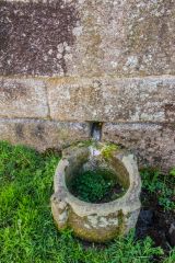 The circular trough to collect the water